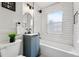 Updated bathroom featuring subway tile, a deep tub, and a stylish vanity at 3346 W 33Rd Ave, Denver, CO 80211