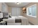 Cozy bedroom featuring a neutral color palette, sliding door closet, and modern décor at 2132 Boise Ct, Longmont, CO 80504