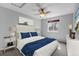 Bedroom with ceiling fan, window, and white furniture at 2132 Boise Ct, Longmont, CO 80504