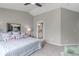 The Main Bedroom includes soft carpet, gray walls and an ensuite bathroom at 2132 Boise Ct, Longmont, CO 80504