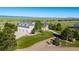 Spacious home with a three-car garage, complemented by a large yard and scenic views at 10515 Lucas Ave, Franktown, CO 80116