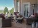 Inviting outdoor deck with comfortable seating and scenic mountain views at 10515 Lucas Ave, Franktown, CO 80116