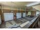 Spacious three car garage with ample storage and natural light at 10515 Lucas Ave, Franktown, CO 80116