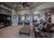 Inviting living room with plush seating, a built-in entertainment center, and an open layout at 10515 Lucas Ave, Franktown, CO 80116