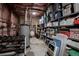 Well-organized basement storage featuring a water heater and lots of shelving at 10515 Lucas Ave, Franktown, CO 80116