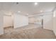 Open basement featuring carpet, bar and kitchenette, ideal for entertaining and relaxing at 9948 King St, Westminster, CO 80031