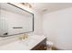 Stylish bathroom with a modern vanity, sleek mirror, and elegant fixtures at 9948 King St, Westminster, CO 80031