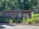 Brick community sign for North Park with attractive landscaping at 9948 King St, Westminster, CO 80031