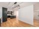 Bright modern kitchen featuring stainless steel appliances and a central island, perfect for cooking and entertaining at 9948 King St, Westminster, CO 80031
