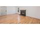 Comfortable living room area with hardwood floors and a view of the fireplace at 9948 King St, Westminster, CO 80031
