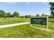 The entrance sign to the community park, Squires Park in Westminster at 9948 King St, Westminster, CO 80031
