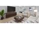 Spacious living room featuring contemporary furnishings, carpeted floors, and a seamless transition into adjacent living spaces at 13739 Legend Trl # 102, Broomfield, CO 80023