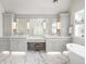 Luxurious bathroom featuring dual vanities, ample counter space, and elegant lighting at 2020 E 4Th Ave, Denver, CO 80206