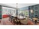 Formal dining room features a large table beneath a chandelier, perfect for hosting elegant dinners at 2020 E 4Th Ave, Denver, CO 80206