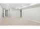 Spacious finished basement with neutral carpet, recessed lighting, and ample room for activities at 4682 Chatham St, Boulder, CO 80301