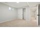 Cozy bedroom boasts plush carpeting, a closet with sliding doors, and a view to another room at 4682 Chatham St, Boulder, CO 80301