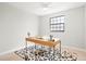 Light-filled bedroom area with a desk, rug, and large window at 4682 Chatham St, Boulder, CO 80301