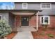 Welcoming front door with stylish accents and well-maintained landscaping at 4682 Chatham St, Boulder, CO 80301