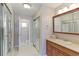 Bathroom boasts a vanity with a sink and mirrored medicine cabinet at 1120 Cholla Ln, Broomfield, CO 80020