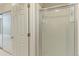 Clean bathroom with shower and a white door at 1120 Cholla Ln, Broomfield, CO 80020