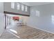 Open concept dining area with hardwood floors and high ceilings at 1120 Cholla Ln, Broomfield, CO 80020