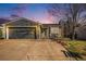 Charming single-Gathering home features a well-maintained yard and an attached two-car garage at 8893 W Ontario Ave, Littleton, CO 80128