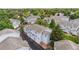 The layout and design of these townhomes can be appreciated from this aerial perspective, mature landscaping at 4070 E 119Th Pl # B, Thornton, CO 80233