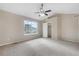 Bedroom featuring carpet, neutral walls, ceiling fan, and a window at 4070 E 119Th Pl # B, Thornton, CO 80233