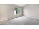 Spacious bedroom featuring neutral walls, carpet floors, and a large window at 4070 E 119Th Pl # B, Thornton, CO 80233