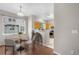 Breakfast nook with hardwood floors and exterior views at 4070 E 119Th Pl # B, Thornton, CO 80233