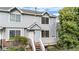 Well-maintained townhome featuring a classic exterior with inviting entryway and large windows at 4070 E 119Th Pl # B, Thornton, CO 80233