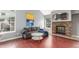 Relaxing living room featuring a decorative fireplace and a cozy grey couch at 8360 W 87Th Dr # D, Arvada, CO 80005
