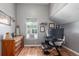 Office room with natural light, wood floors, and neutral color scheme at 8360 W 87Th Dr # D, Arvada, CO 80005