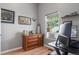 Office room with natural light, wood floors, and neutral color scheme at 8360 W 87Th Dr # D, Arvada, CO 80005