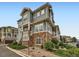 Eye-catching condo with stone accents, private balconies, and meticulously maintained landscaping at 9363 Amison Cir # 106, Parker, CO 80134