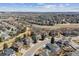 Aerial view of community showcasing the home in a neighborhood with mature trees at 16302 Parkside Dr, Parker, CO 80134