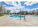 Community pool area with splash pad features, pool, clubhouse and ample lounge space at 16302 Parkside Dr, Parker, CO 80134