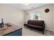 Office space featuring a futon and work desk with natural light at 4947 Stoneham Ave, Castle Rock, CO 80104