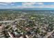 Breathtaking aerial view of neighborhood surrounded by lush greenery with mountains in the distance at 739 S Utica St, Denver, CO 80219