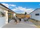 A spacious backyard with a patio, seating, and a fire pit, perfect for outdoor entertaining at 739 S Utica St, Denver, CO 80219