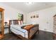 Cozy bedroom featuring natural light, hardwood floors, and closet at 739 S Utica St, Denver, CO 80219