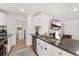 Modern kitchen featuring stainless steel appliances and granite countertops, ideal for culinary adventures and entertaining guests at 739 S Utica St, Denver, CO 80219