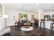 Spacious open floor plan that combines a living room, dining area, and kitchen, ideal for modern living at 739 S Utica St, Denver, CO 80219
