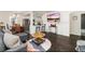 Inviting living room featuring hardwood floors, modern furnishings, and an open floor plan at 739 S Utica St, Denver, CO 80219