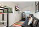 Comfortable living room with large windows, and colorful decor at 739 S Utica St, Denver, CO 80219