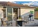 Outdoor patio with fire pit, furniture, and a barbecue grill, ideal for entertaining at 739 S Utica St, Denver, CO 80219