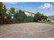 Community basketball court with green fence, great for sports and recreation at 1179 S Alton Ct, Denver, CO 80247