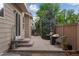 Inviting patio with comfortable seating and a cozy fire pit, perfect for outdoor gatherings at 1179 S Alton Ct, Denver, CO 80247