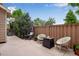 Wonderful patio with a fire pit, chairs, and string lights for a fun outdoor space at 1179 S Alton Ct, Denver, CO 80247