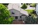 Back exterior of home with a nice patio area perfect for outdoor entertaining or relaxation at 1179 S Alton Ct, Denver, CO 80247